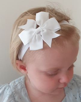 Hårbandet STINA med rosett